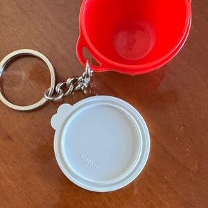 Mini Tupperware bowl Red Keychain with Metal Ring Excellent condition.